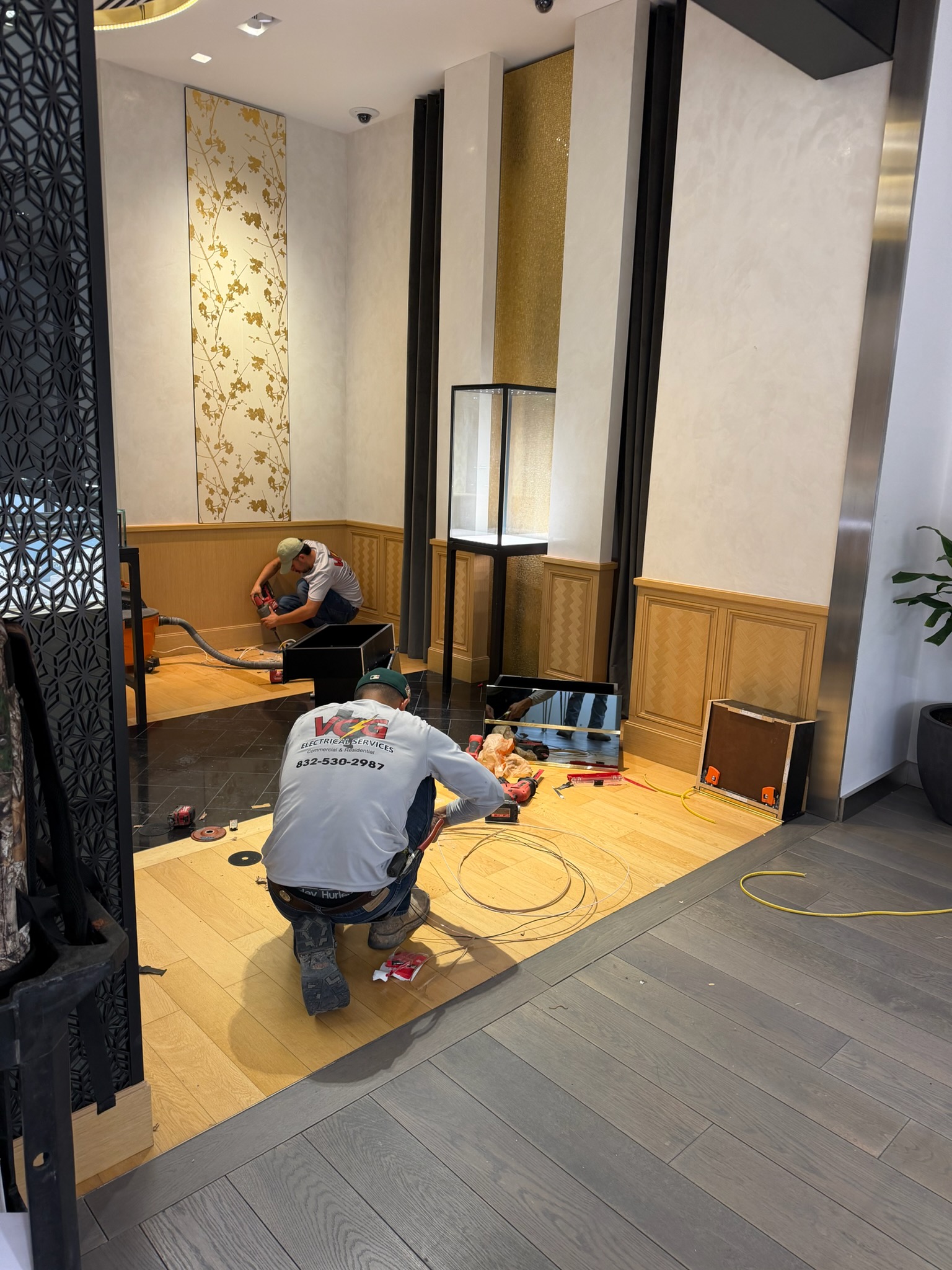 VCG crew working inside a retail interior.