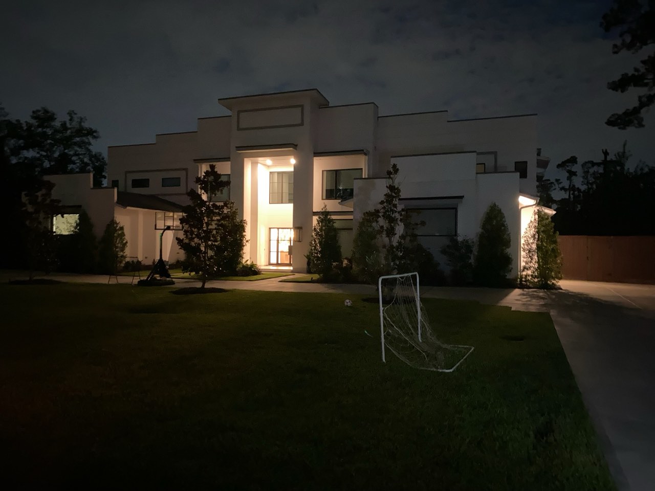 Outdoor landscape lighting installed at a Houston property